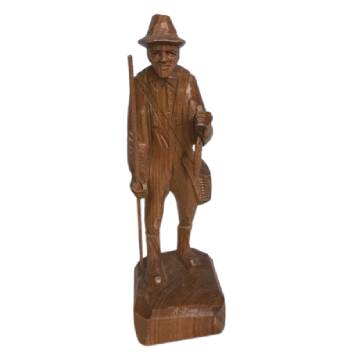 Talla de madera vintage de un pescador quebequense