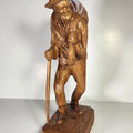 Talla de madera vintage de un pescador quebequense